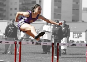 girl doing hurdles